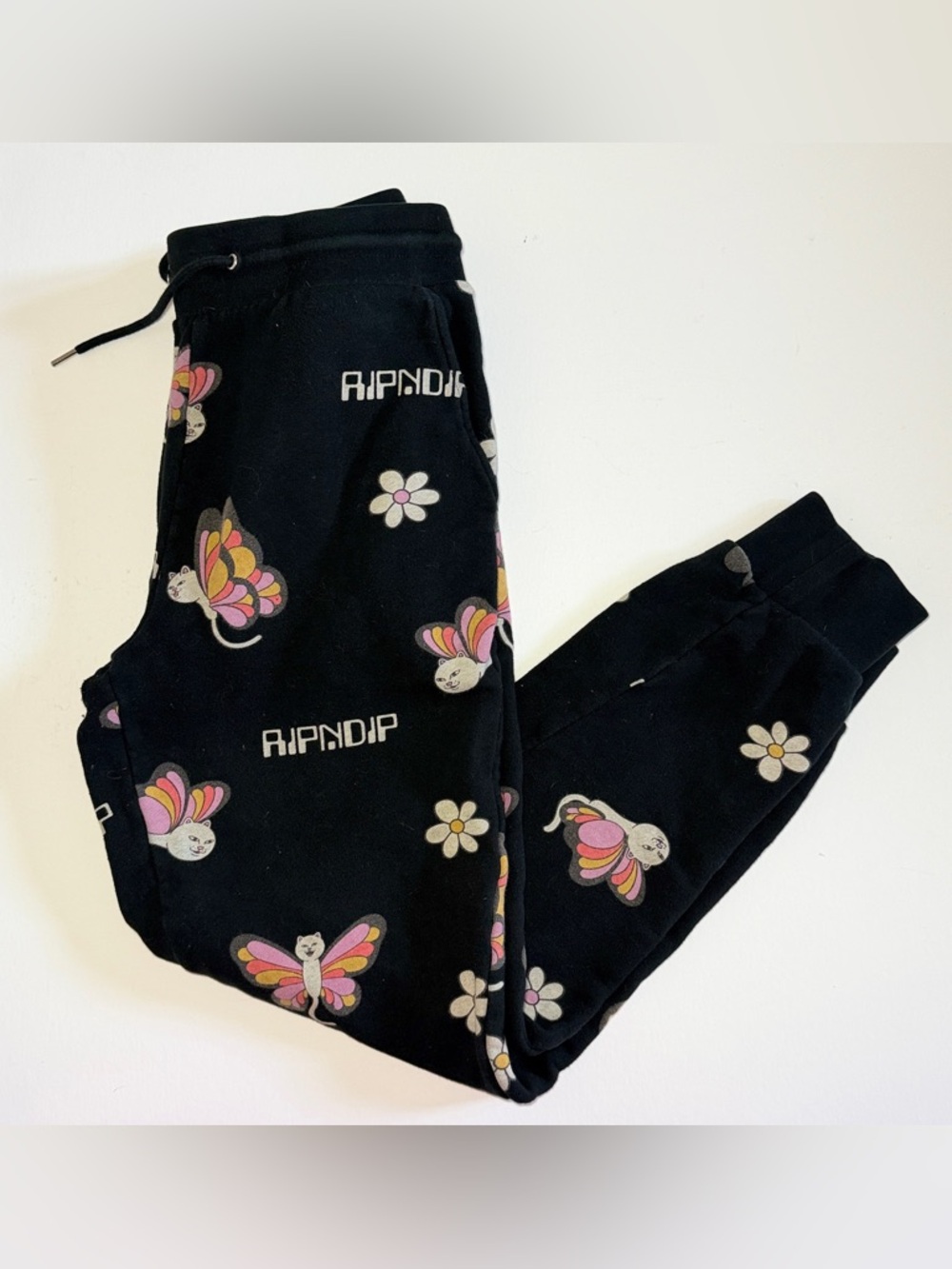 Ripndip Black Sweatpants with Pink & Yellow Butterfly Cat and White Daisy Print - Picture 3 of 9